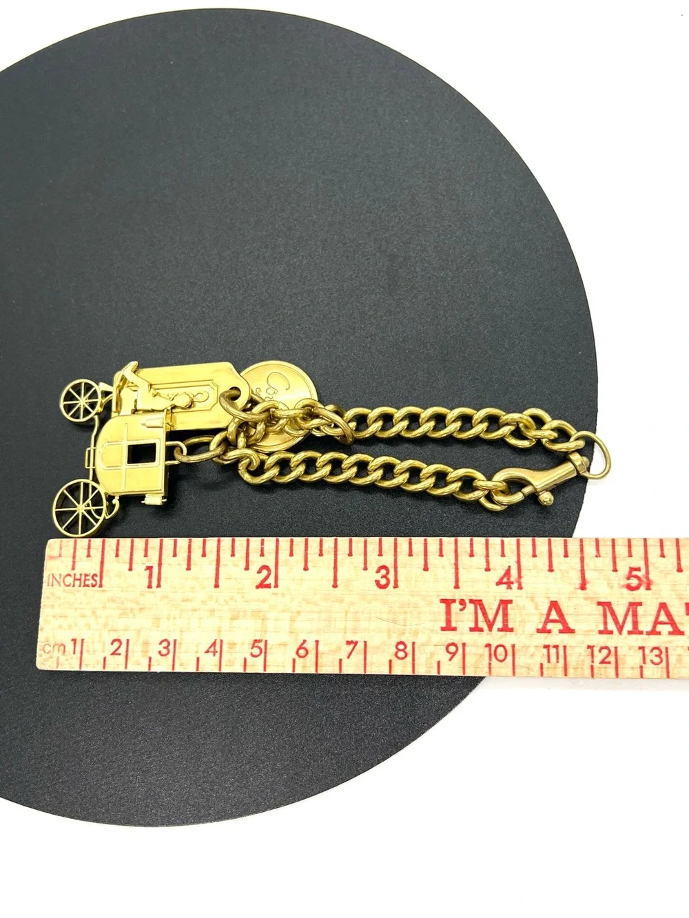 Coach Gold Tone Charm Bracelet with Carriage Charms